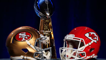 MIAMI, FLORIDA - JANUARY 29: The Vince Lombardi Trophy is displayed with helmets of the San Francisco 49ers and Kansas City Chiefs prior to a press conference with NFL Commissioner Roger Goodell for Super Bowl LIV at the Hilton Miami Downtown on January 29, 2020 in Miami, Florida. The 49ers will face the Chiefs in the 54th playing of the Super Bowl, Sunday February 2nd. (Photo by Cliff Hawkins/Getty Images)