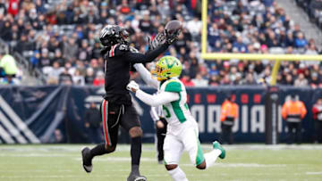 EAST RUTHERFORD, NEW JERSEY - FEBRUARY 09: Mekale McKay #1 of the NY Guardians attempts to make a catch over Anthoula Kelly #23 of the Tampa Bay Vipers during the first half of their XFL game at MetLife Stadium on February 09, 2020 in East Rutherford, New Jersey. The NY Guardians won, 23-3. (Photo by Michael Owens/Getty Images)