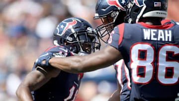 LOS ANGELES, CA - AUGUST 25: Quan Bray #11 of the Houston Texans celebrates his touchdown with Anthony Coyle #78 and Jester Weah #86 to trail 21-20 to the Los Angeles Rams during a preseason game at Los Angeles Memorial Coliseum on August 25, 2018 in Los Angeles, California. (Photo by Harry How/Getty Images)