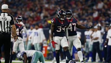 HOUSTON, TX - AUGUST 30: Dee Virgin #34 of the Houston Texans celebrates after tackling Lance Lenoir #14 of the Dallas Cowboys in the first half of the preseason game at NRG Stadium on August 30, 2018 in Houston, Texas. (Photo by Tim Warner/Getty Images)