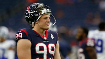 HOUSTON, TX - AUGUST 30: J.J. Watt #99 of the Houston Texans watches players warm up before the preseason game against the Dallas Cowboys at NRG Stadium on August 30, 2018 in Houston, Texas. (Photo by Tim Warner/Getty Images)