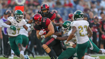 SAN DIEGO, CA - SEPTEMBER 08: Kahale Warring #87 of the San Diego State Aztecs runs with the ball in the first half against the Sacramento State Hornets at SDCCU Stadium on September 8, 2018 in San Diego, California. (Photo by Kent Horner/Getty Images)