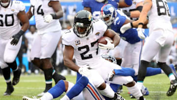 EAST RUTHERFORD, NJ - SEPTEMBER 09: Leonard Fournette #27 of the Jacksonville Jaguars runs with the ball against Janoris Jenkins #20 of the New York Giants in the first quarter at MetLife Stadium on September 9, 2018 in East Rutherford, New Jersey. (Photo by Mike Lawrie/Getty Images)