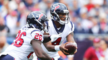 FOXBOROUGH, MA - SEPTEMBER 09: Deshaun Watson #4 of the Houston Texans hands the ball off to Lamar Miller #26 during the game against the New England Patriots at Gillette Stadium on September 9, 2018 in Foxborough, Massachusetts. (Photo by Maddie Meyer/Getty Images)