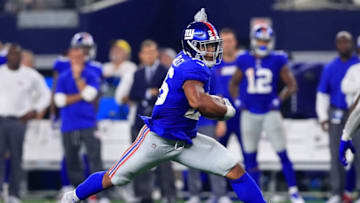 ARLINGTON, TX - SEPTEMBER 16: Saquon Barkley #26 of the New York Giants carries the ball against the Dallas Cowboys in the fourth quarter at AT&T Stadium on September 16, 2018 in Arlington, Texas. (Photo by Tom Pennington/Getty Images)