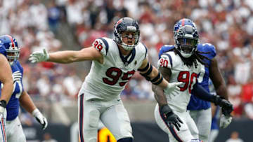 HOUSTON, TX - SEPTEMBER 23: J.J. Watt #99 of the Houston Texans celebrates after sacking Eli Manning #10 of the New York Giants in the fourth quarter at NRG Stadium on September 23, 2018 in Houston, Texas. (Photo by Tim Warner/Getty Images)