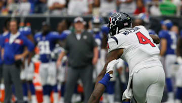 HOUSTON, TX - SEPTEMBER 23: Deshaun Watson #4 of the Houston Texans is sacked by Mario Edwards #99 of the New York Giants in the fourth quarter at NRG Stadium on September 23, 2018 in Houston, Texas. (Photo by Bob Levey/Getty Images)