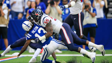 INDIANAPOLIS, IN - SEPTEMBER 30: T.Y. Hilton #13 of the Indianapolis Colts is tackled by Benardrick McKinney #55 of the Houston Texans at Lucas Oil Stadium on September 30, 2018 in Indianapolis, Indiana. (Photo by Andy Lyons/Getty Images)