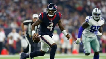 HOUSTON, TX - OCTOBER 07: Deshaun Watson #4 of the Houston Texans scrables under pressure from Demarcus Lawrence #90 of the Dallas Cowboys in the first quarter at NRG Stadium on October 7, 2018 in Houston, Texas. (Photo by Tim Warner/Getty Images)