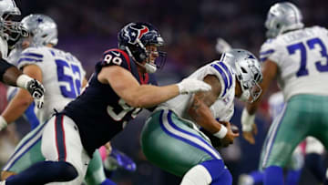 HOUSTON, TX - OCTOBER 07: J.J. Watt #99 of the Houston Texans pressures Dak Prescott #4 of the Dallas Cowboys in the fourth quarter at NRG Stadium on October 7, 2018 in Houston, Texas. (Photo by Tim Warner/Getty Images)