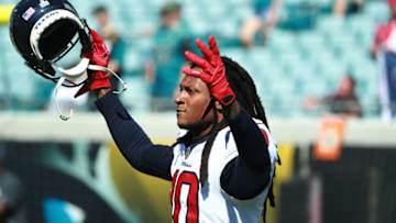 JACKSONVILLE, FL - OCTOBER 21: DeAndre Hopkins #10 of the Houston Texans works out on the field before their game against the Jacksonville Jaguars at TIAA Bank Field on October 21, 2018 in Jacksonville, Florida. (Photo by Scott Halleran/Getty Images)