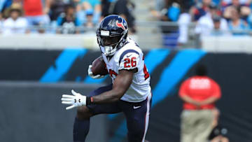 JACKSONVILLE, FL - OCTOBER 21: Lamar Miller #26 of the Houston Texans rushes for yardage during the game against the Jacksonville Jaguars at TIAA Bank Field on October 21, 2018 in Jacksonville, Florida. (Photo by Sam Greenwood/Getty Images)