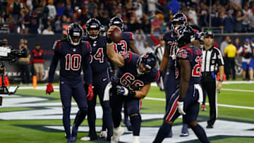 HOUSTON, TX - OCTOBER 25: Nick Martin #66 of the Houston Texans spikes the ball in celebration after a DeAndre Hopkins #10 touchdown against the Miami Dolphins in the fourth quarter at NRG Stadium on October 25, 2018 in Houston, Texas. (Photo by Bob Levey/Getty Images)