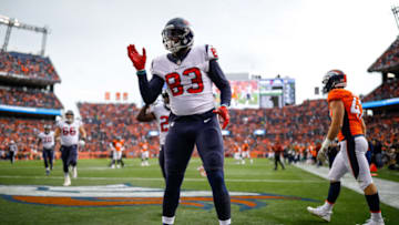 DENVER, CO - NOVEMBER 4: Tight end Jordan Thomas #83 of the Houston Texans celebrates after catching a first-quarter touchdown pass under coverage by inside linebacker Josey Jewell #47 of the Denver Broncos at Broncos Stadium at Mile High on November 4, 2018 in Denver, Colorado. (Photo by Justin Edmonds/Getty Images)