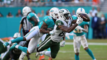 MIAMI, FL - NOVEMBER 04: Quincy Enunwa #81 of the New York Jets completes a reception against the defense of Cornell Armstrong #31 of the Miami Dolphins in the second half of their game at Hard Rock Stadium on November 4, 2018 in Miami, Florida. (Photo by Mark Brown/Getty Images)