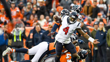 DENVER, CO - NOVEMBER 4: Quarterback Deshaun Watson #4 of the Houston Texans scrambles against the Denver Broncos in the third quarter of a game at Broncos Stadium at Mile High on November 4, 2018 in Denver, Colorado. (Photo by Dustin Bradford/Getty Images)