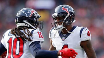 LANDOVER, MD - NOVEMBER 18: Deshaun Watson #4 of the Houston Texans celebrates with DeAndre Hopkins #10 after hooking up on a 16-yard touchdown in the first quarter of the game against the Washington Redskins at FedExField on November 18, 2018 in Landover, Maryland. (Photo by Joe Robbins/Getty Images)