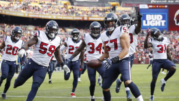 LANDOVER, MD - NOVEMBER 18: Brennan Scarlett #57 of the Houston Texans celebrates with teammates after intercepting a pass in the second quarter of the game against the Washington Redskins at FedExField on November 18, 2018 in Landover, Maryland. (Photo by Joe Robbins/Getty Images)