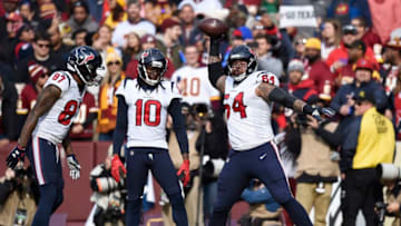 LANDOVER, MD - NOVEMBER 18: DeAndre Hopkins #10 of the Houston Texans celebrates with teammates Demaryius Thomas #87 and Senio Kelemete #64 after scoring a touchdown in the first quarter against the Washington Redskins at FedExField on November 18, 2018 in Landover, Maryland. (Photo by Patrick McDermott/Getty Images)