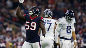 HOUSTON, TX - NOVEMBER 26: Whitney Mercilus #59 of the Houston Texans celebrates after sacking Marcus Mariota #8 of the Tennessee Titans in the fourth quarter at NRG Stadium on November 26, 2018 in Houston, Texas. (Photo by Tim Warner/Getty Images)