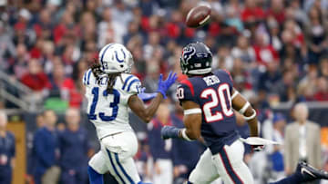 HOUSTON, TX - DECEMBER 09: T.Y. Hilton #13 of the Indianapolis Colts catches a pass in the second quarter defended by Justin Reid #20 of the Houston Texans at NRG Stadium on December 9, 2018 in Houston, Texas. (Photo by Tim Warner/Getty Images)