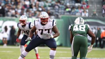 EAST RUTHERFORD, NEW JERSEY - NOVEMBER 25: Trent Brown #77 of the New England Patriots in action against the New York Jets during their game at MetLife Stadium on November 25, 2018 in East Rutherford, New Jersey. (Photo by Al Bello/Getty Images)
