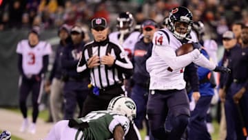EAST RUTHERFORD, NJ - DECEMBER 15: Wide receiver DeAndre Carter #14 of the Houston Texans runs the ball against cornerback Morris Claiborne #21 of the New York Jets during the first half at MetLife Stadium on December 15, 2018 in East Rutherford, New Jersey. The Houston Texans won 29-22. (Photo by Steven Ryan/Getty Images)