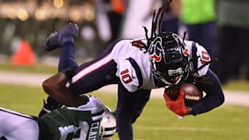 EAST RUTHERFORD, NJ - DECEMBER 15: Wide receiver DeAndre Hopkins #10 of the Houston Texans is tackled by cornerback Morris Claiborne #21 of the New York Jets during the second half at MetLife Stadium on December 15, 2018 in East Rutherford, New Jersey. The Houston Texans won 29-22. (Photo by Mark Brown/Getty Images)