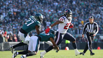 PHILADELPHIA, PA - DECEMBER 23: Cornerback Rasul Douglas #32 of the Philadelphia Eagles tackles running back D'Onta Foreman #27 of the Houston Texans in the first quarter at Lincoln Financial Field on December 23, 2018 in Philadelphia, Pennsylvania. (Photo by Brett Carlsen/Getty Images)