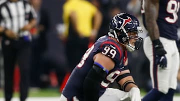 HOUSTON, TX - JANUARY 05: J.J. Watt #99 of the Houston Texans walks off the field holding his right wrist during the fourth quarter against the Indianapolis Colts during the Wild Card Round at NRG Stadium on January 5, 2019 in Houston, Texas. (Photo by Bob Levey/Getty Images)