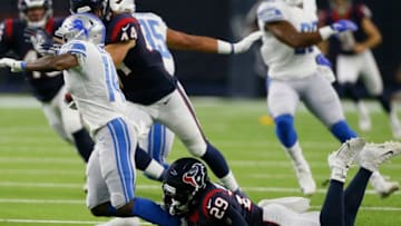 HOUSTON, TEXAS - AUGUST 17: Briean Boddy-Calhoun #29 of the Houston Texans tackles Tommylee Lewis #14 of the Detroit Lions during the second quarter in a preseason game at NRG Stadium on August 17, 2019 in Houston, Texas. (Photo by Bob Levey/Getty Images)