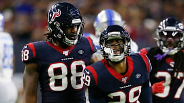 HOUSTON, TEXAS - AUGUST 17: Briean Boddy-Calhoun #29 of the Houston Texans celebrates with Jordan Akins #88 after tackling Tommylee Lewis #14 of the Detroit Lions in the second quarter during a preseason game at NRG Stadium on August 17, 2019 in Houston, Texas. (Photo by Bob Levey/Getty Images)