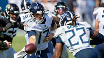 Ryan Tannehill #17 hands off the ball to Derrick Henry #22 Tennessee Titans (Photo by Wesley Hitt/Getty Images)