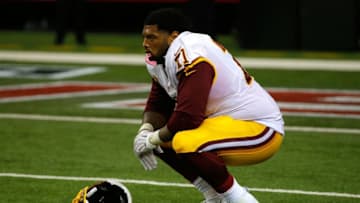 ATLANTA, GA - OCTOBER 11: Trent Williams #71 of the Washington Redskins reacts after Robert Alford #23 of the Atlanta Falcons returned an interception for a touchdown in their 25-19 loss at Georgia Dome on October 11, 2015 in Atlanta, Georgia. (Photo by Kevin C. Cox/Getty Images)