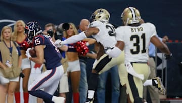 HOUSTON, TX - AUGUST 20: Will Fuller #15 of the Houston Texans catches a pass for a touchdown in the first quarter as he beats P.J. Williams #25 of the New Orleans Saints and Jairus Byrd #31 during a preseason NFL game at NRG Stadium on August 20, 2016 in Houston, Texas. (Photo by Bob Levey/Getty Images)