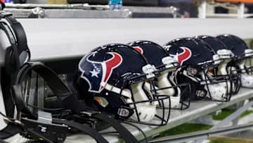 HOUSTON, TX - DECEMBER 24: A general view of Bose headsets and Houston Texans helmets on the bench before the game against the Cincinnati Bengals at NRG Stadium on December 24, 2016 in Houston, Texas. (Photo by Tim Warner/Getty Images)