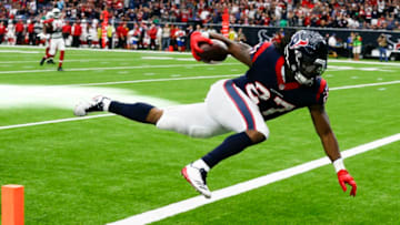HOUSTON, TX - NOVEMBER 19: D'Onta Foreman #27 of the Houston Texans runs 34 yards for a touchdown in the fourth quarter against the Arizona Cardinals at NRG Stadium on November 19, 2017 in Houston, Texas. Foreman was injured on the play and was taken off on a cart. (Photo by Bob Levey/Getty Images)