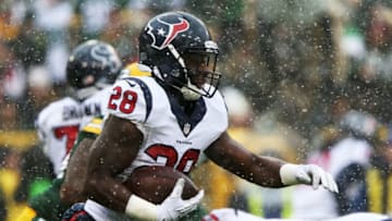 GREEN BAY, WI - DECEMBER 04: Alfred Blue #28 of the Houston Texans runs with the ball in the first quarter against the Green Bay Packers at Lambeau Field on December 4, 2016 in Green Bay, Wisconsin. (Photo by Dylan Buell/Getty Images)