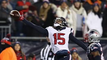 FOXBORO, MA - JANUARY 14: Will Fuller V #15 of the Houston Texans reaches for a ball in the first half against the New England Patriots during the AFC Divisional Playoff Game at Gillette Stadium on January 14, 2017 in Foxboro, Massachusetts. (Photo by Elsa/Getty Images)