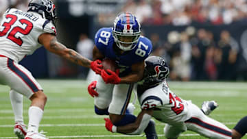 HOUSTON, TX - SEPTEMBER 23: Sterling Shepard #87 of the New York Giants is tackled by Aaron Colvin #22 of the Houston Texans in the second quarter at NRG Stadium on September 23, 2018 in Houston, Texas. (Photo by Tim Warner/Getty Images)