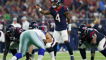 HOUSTON, TX - OCTOBER 07: Quarterback Deshaun Watson #4 of the Houston Texans signals at the line of scrimmage in the second quarter against the Dallas Cowboys at NRG Stadium on October 7, 2018 in Houston, Texas. (Photo by Tim Warner/Getty Images)