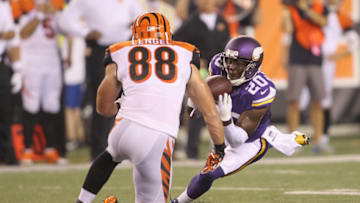 CINCINNATI, OH - AUGUST 12: Mackensie Alexander #20 of the Minnesota Vikings makes the interception in front of Matt Lengel #88 of the Cincinnati Bengals during their game at Paul Brown Stadium on August 12, 2016 in Cincinnati, Ohio. The Vikings defeated Bengals 17-16. (Photo by John Grieshop/Getty Images)