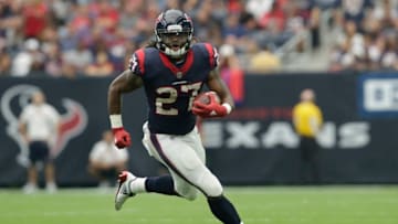 HOUSTON, TX - OCTOBER 01: D'Onta Foreman #27 of the Houston Texans runs the ball in the fourth quarter against the Tennessee Titans at NRG Stadium on October 1, 2017 in Houston, Texas. (Photo by Tim Warner/Getty Images)