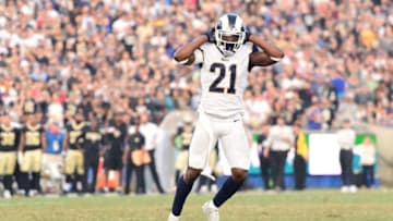 LOS ANGELES, CA - NOVEMBER 26: Kayvon Webster #21 of the Los Angeles Rams celebrates a tackle on third down to bring on a field goal during the game against the New Orleans Saints at the Los Angeles Memorial Coliseum on November 26, 2017 in Los Angeles, California. (Photo by Harry How/Getty Images)