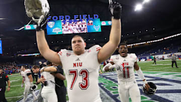 DETROIT, MICHIGAN - NOVEMBER 30: Max Scharping #73 of the Northern Illinois Huskies celebrates after defeating the Buffalo Bulls 30-29 to win the MAC Championship at Ford Field on November 30, 2018 in Detroit, Michigan. (Photo by Gregory Shamus/Getty Images)