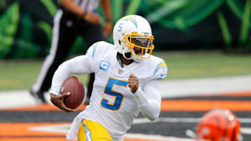 quarterback Tyrod Taylor (5) signs with the Houston Texans Mandatory Credit: Joseph Maiorana-USA TODAY Sports