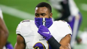 Mark Ingram (21) adjusts his face mask Mandatory Credit: Scott Galvin-USA TODAY Sports