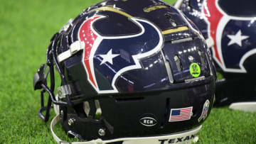 Nov 26, 2018; Houston, TX, USA; Detailed view of decal initials RCM on the back of a Houston Texans helmet at NRG Stadium in the memory of Texans owner Robert C. McNair (Bob McNair) who died at the age of 81. Mandatory Credit: Kirby Lee-USA TODAY Sports