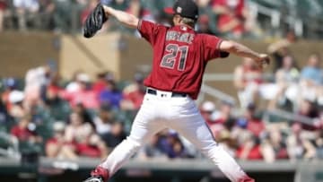 Mar 4, 2016; Salt River Pima-Maricopa, AZ, USA; Arizona Diamondbacks starting pitcher Zack Greinke (21) throws in the second inning during a spring training game against the Oakland Athletics at Salt River Fields at Talking Stick. Mandatory Credit: Rick Scuteri-USA TODAY Sports