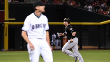 Justin Bour #41 of the Miami Marlins rounds the bases after hitting a grand slam home run off of Tyler Clippard #19 of the Arizona Diamondbacks during the seventh inning at Chase Field on June 10, 2016 in Phoenix, Arizona.(June 9, 2016 - Source: Norm Hall/Getty Images North America)
